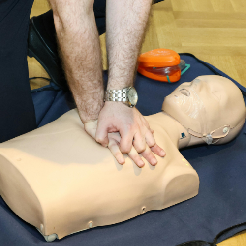 Image of a first aider at work